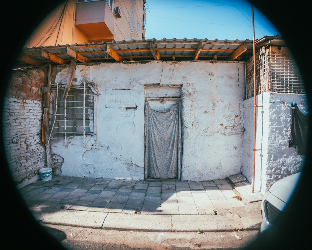 Security camera angled toward a doorway at face level to capture clear identification